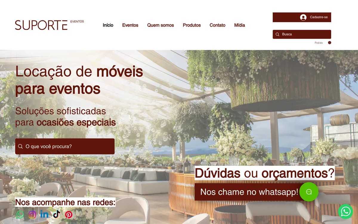 Home antiga do site em Wix, com busca e chamada para o WhatsApp